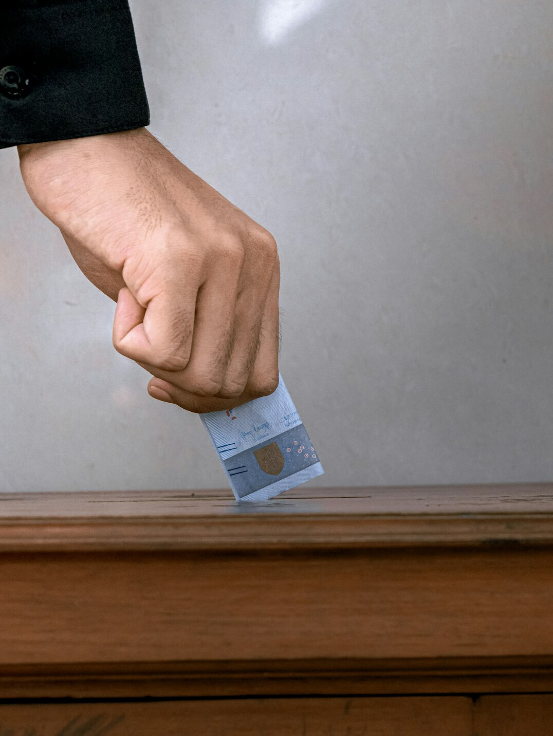 person saving coins