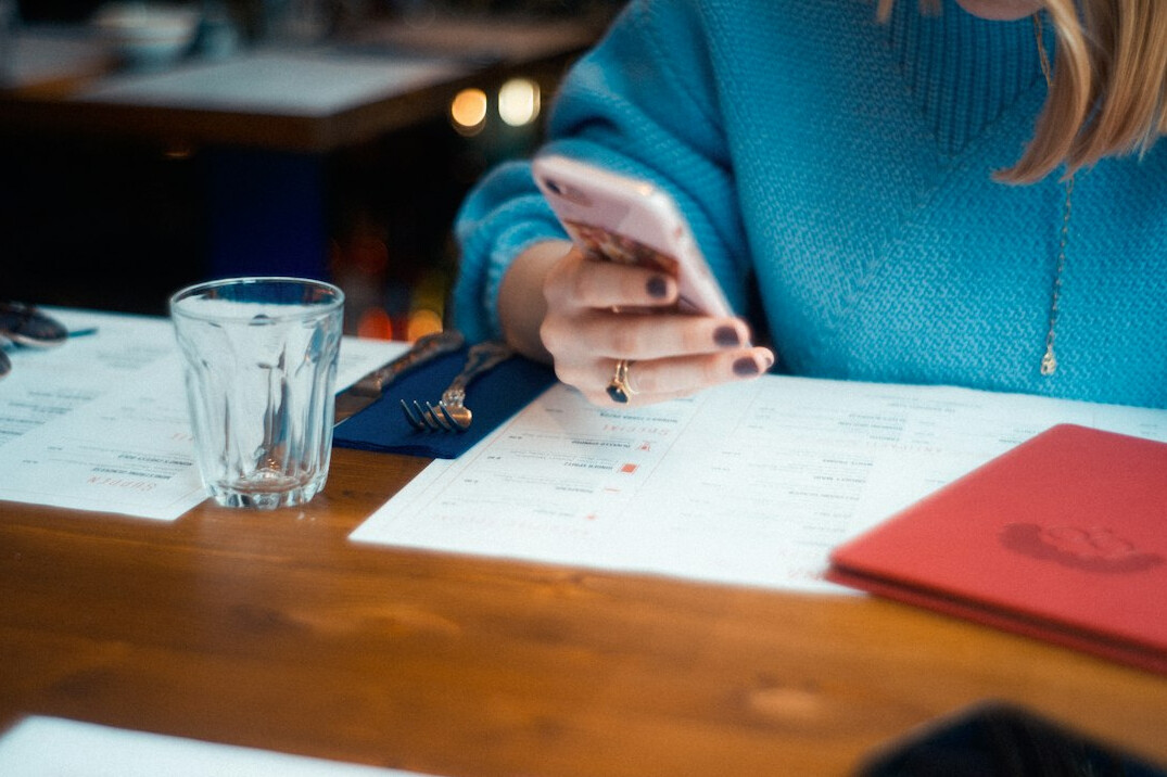 woman reviewing bank statements
