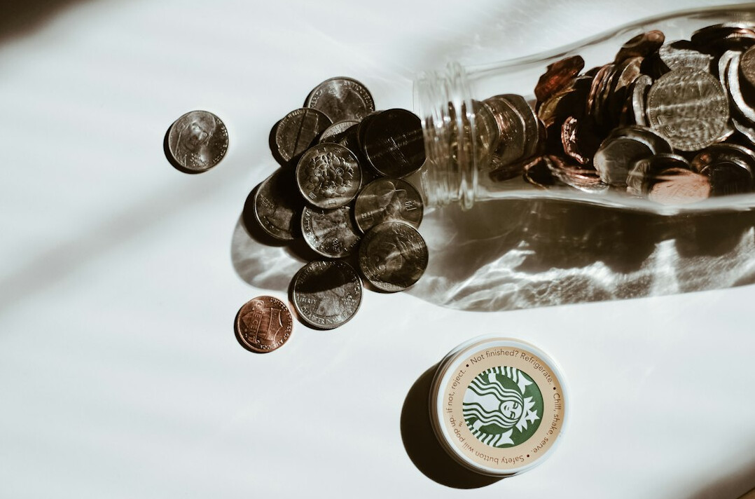 savings jar with coins
