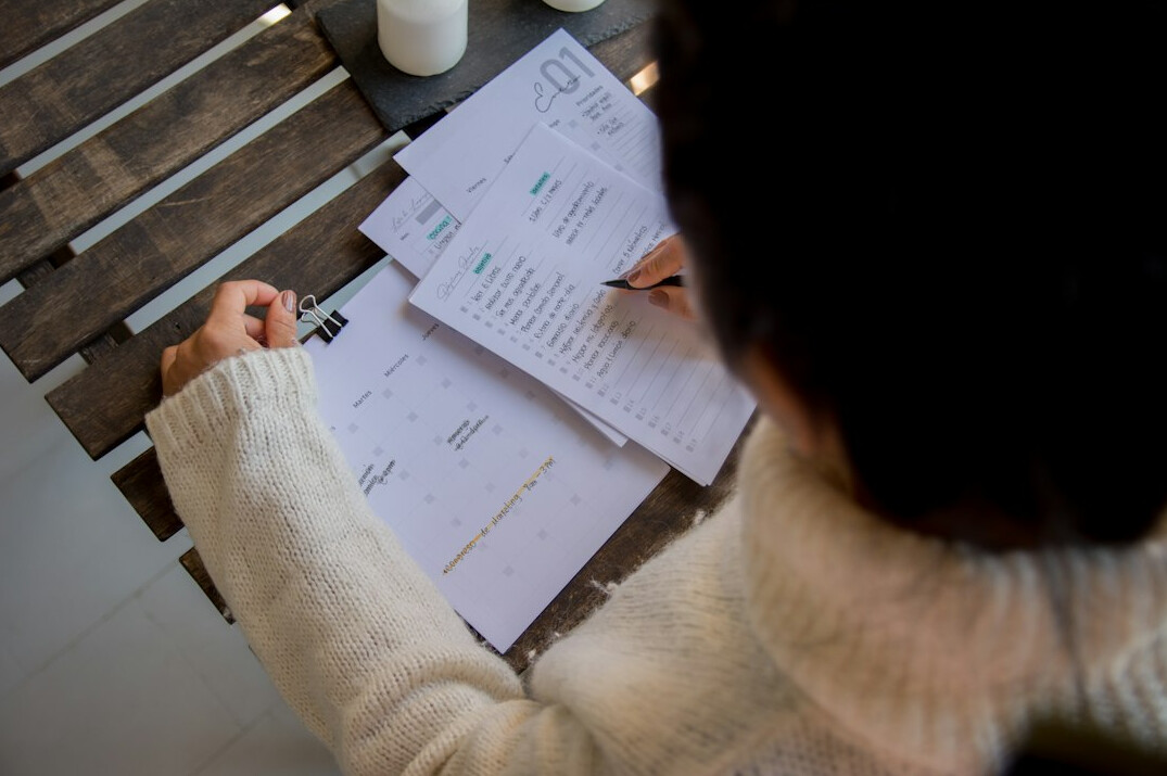 person reviewing budget spreadsheet